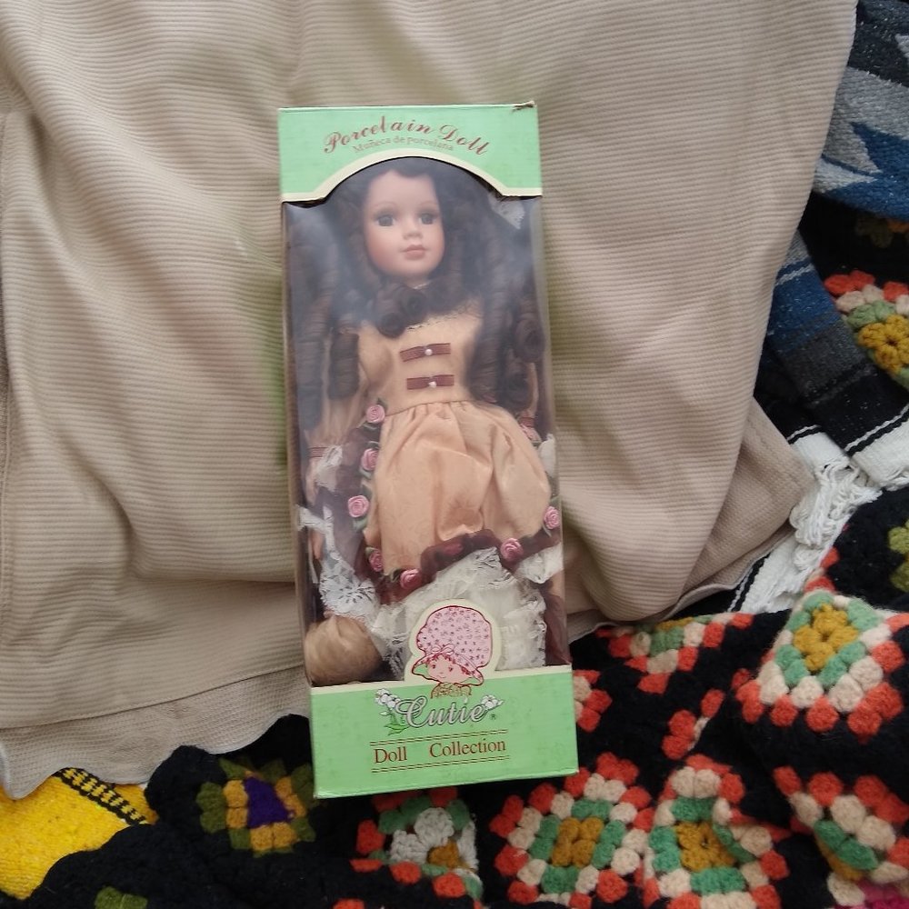 Cutie Porcelain Doll 16 inches